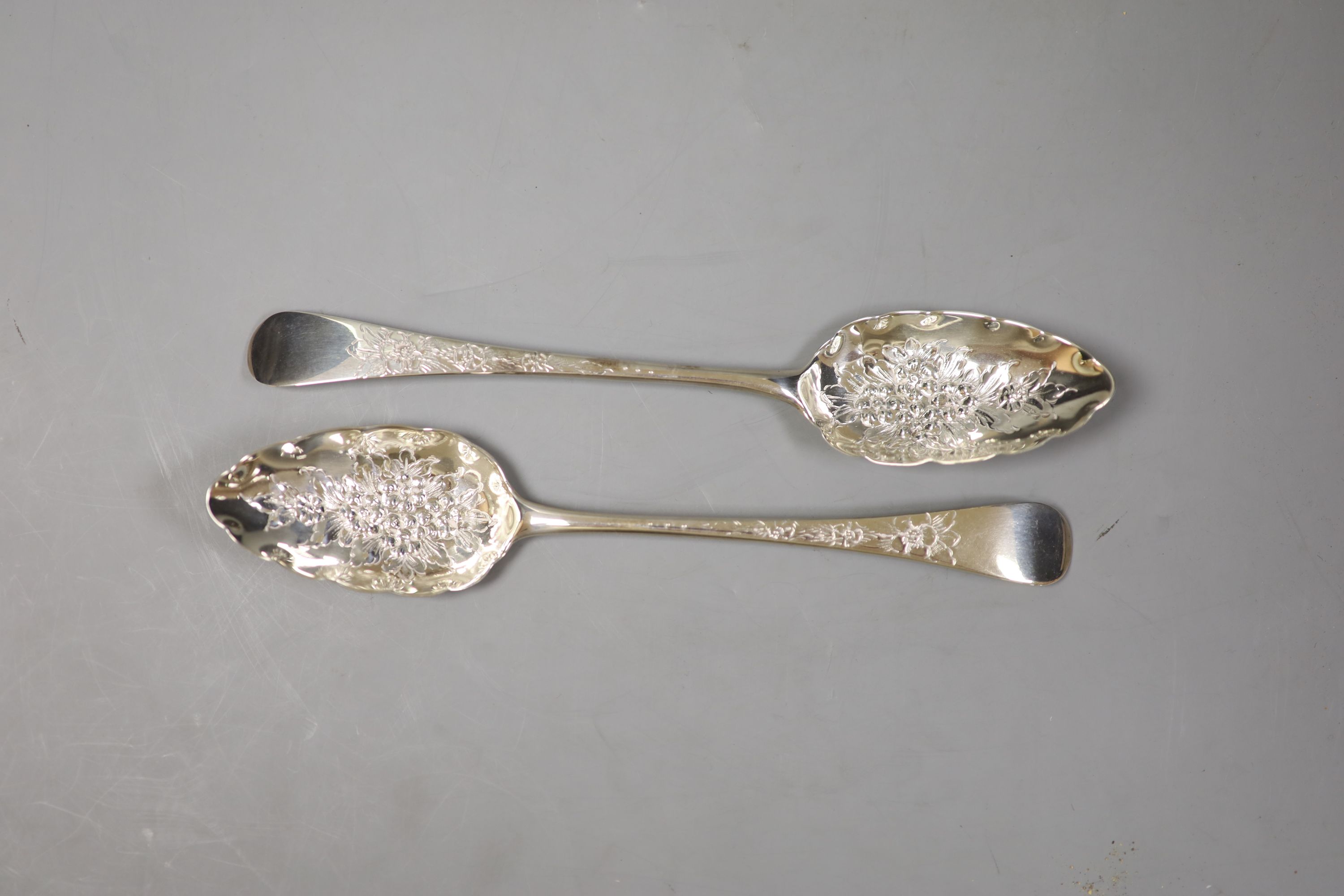 A pair of late Georgian silver berry spoons, London, 1794,